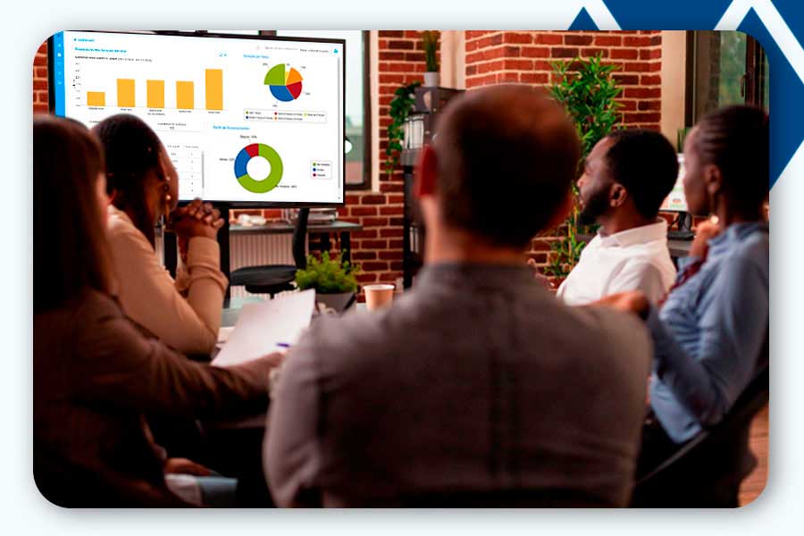 People looking at detailed neptune reports on bookings, occupancy forecasts and resource utilization.